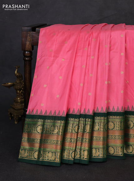 Pure narayanpet silk saree candy pink and bottle green with allover zari woven buttas and temple design long zari woven border
