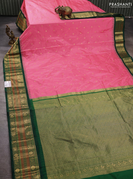 Pure narayanpet silk saree candy pink and bottle green with allover zari woven buttas and temple design long zari woven border