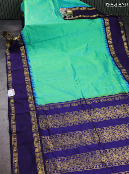 Pure narayanpet silk saree teal green and violet with zari woven buttas and long rettapet zari woven border