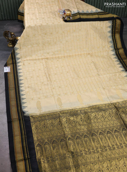 Pure narayanpet silk saree cream and black with allover zari checks & buttas and temple design zari woven border