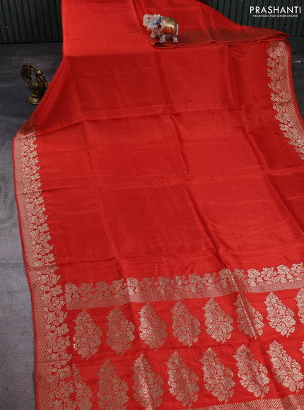 Dola silk saree orange with plain body and zari woven border