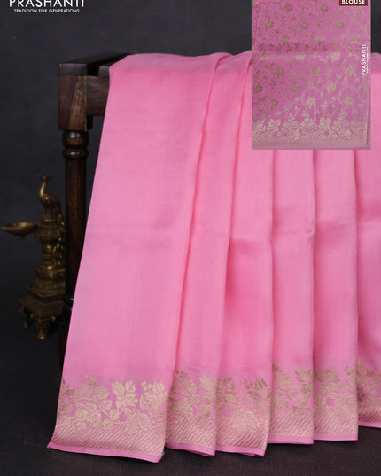 Dola silk saree light pink with plain body and zari woven border