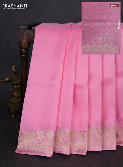 Dola silk saree light pink with plain body and zari woven border