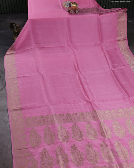 Dola silk saree light pink with plain body and zari woven border