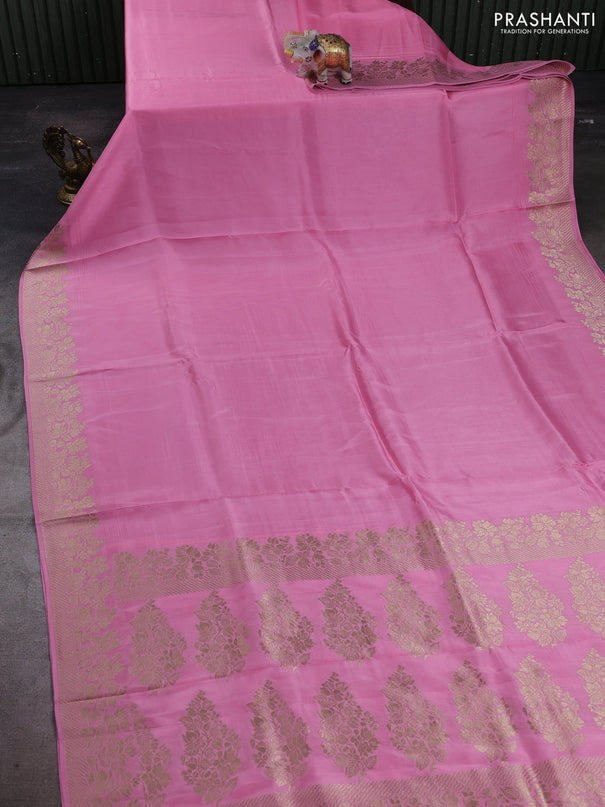 Dola silk saree light pink with plain body and zari woven border