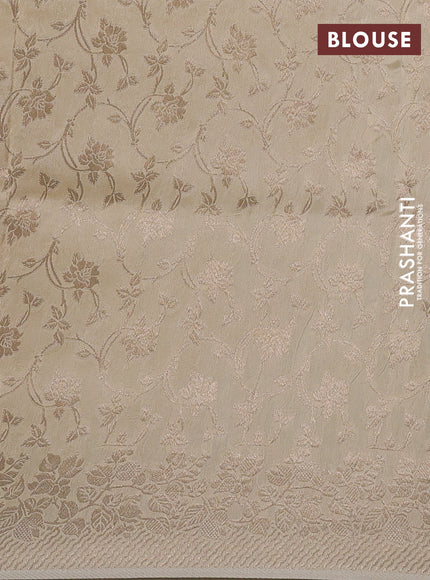 Dola silk saree cream with plain body and zari woven border
