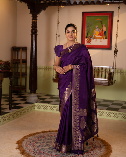 Dola silk saree purple with plain body and zari woven border