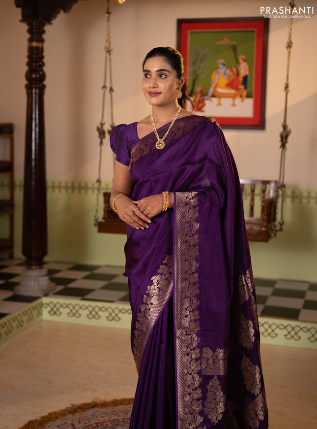 Dola silk saree purple with plain body and zari woven border