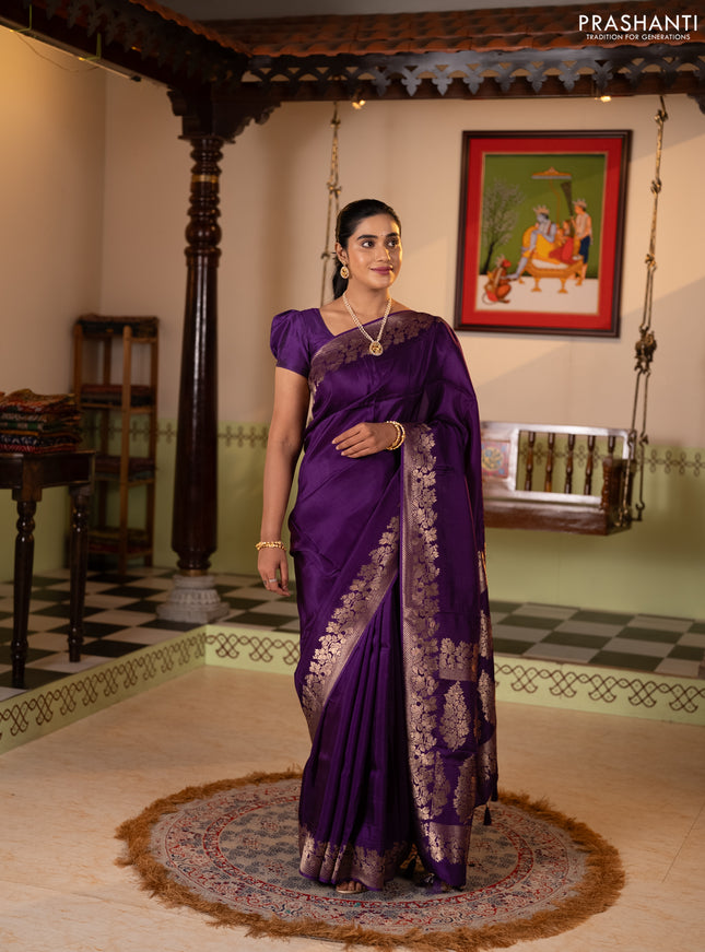 Dola silk saree purple with plain body and zari woven border