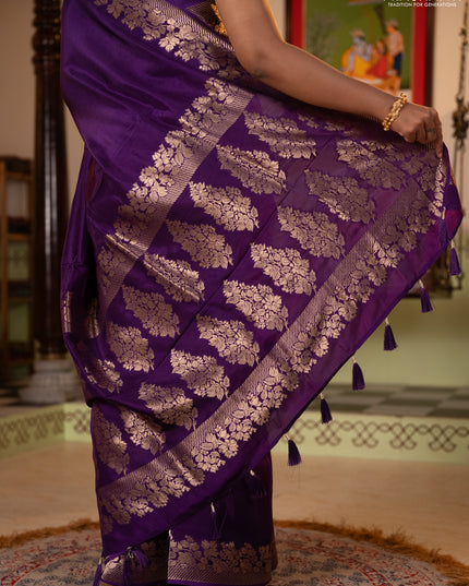 Dola silk saree purple with plain body and zari woven border