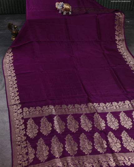 Dola silk saree purple with plain body and zari woven border