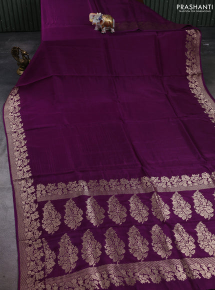 Dola silk saree purple with plain body and zari woven border