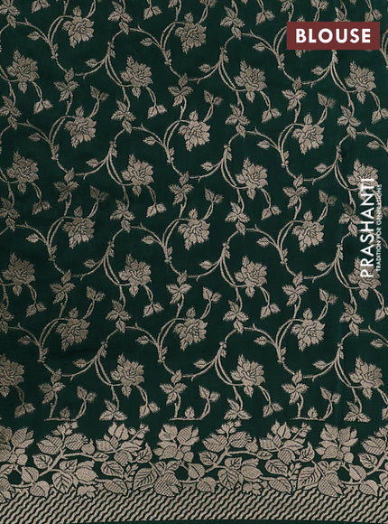 Dola silk saree bottle green with plain body and zari woven border