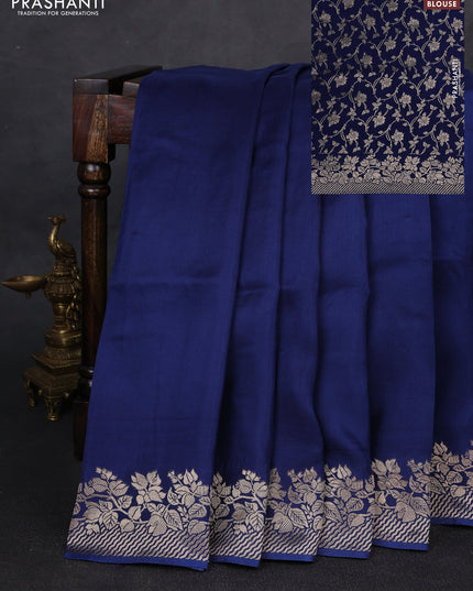 Dola silk saree navy blue with plain body and zari woven border