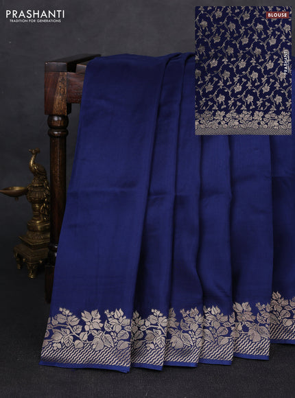 Dola silk saree navy blue with plain body and zari woven border