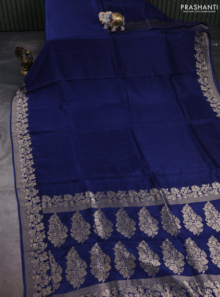 Dola silk saree navy blue with plain body and zari woven border