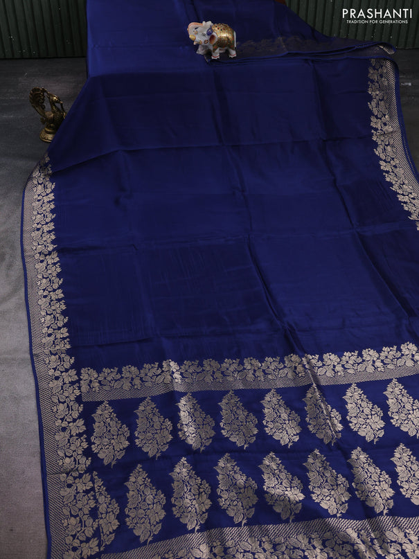 Dola silk saree navy blue with plain body and zari woven border