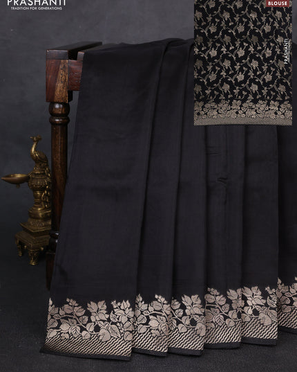 Dola silk saree black with plain body and zari woven border