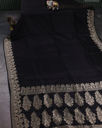 Dola silk saree black with plain body and zari woven border