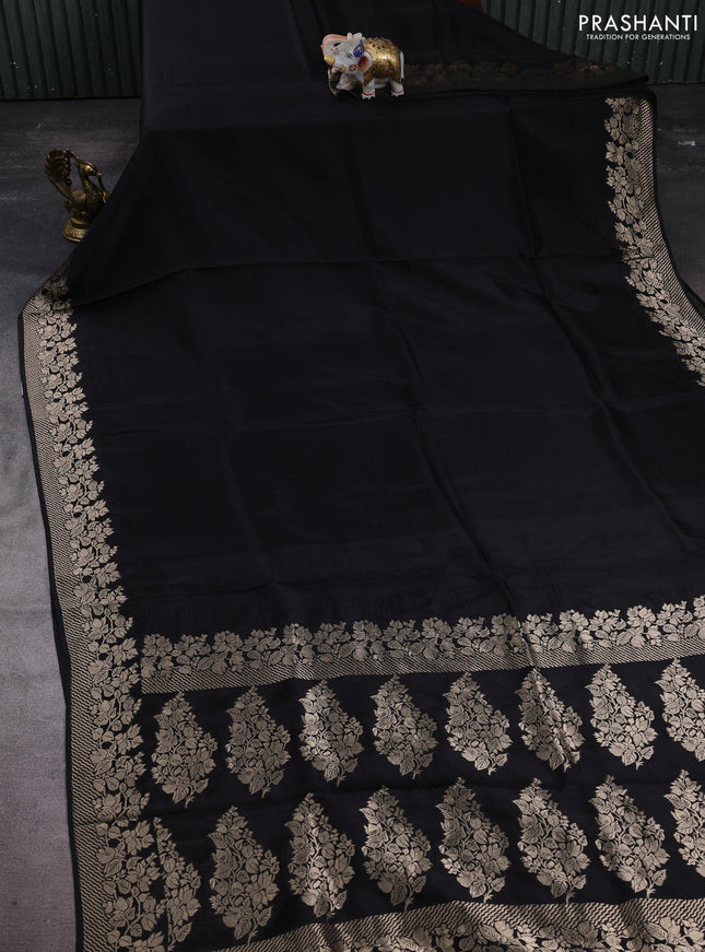 Dola silk saree black with plain body and zari woven border