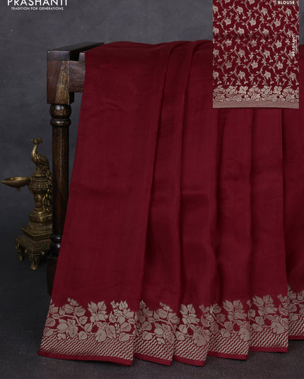 Dola silk saree maroon with plain body and zari woven border