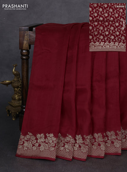 Dola silk saree maroon with plain body and zari woven border