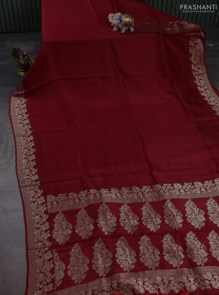 Dola silk saree maroon with plain body and zari woven border