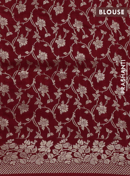 Dola silk saree maroon with plain body and zari woven border