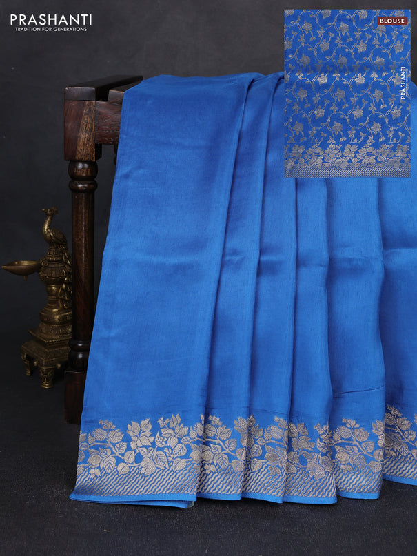 Dola silk saree blue with plain body and zari woven border