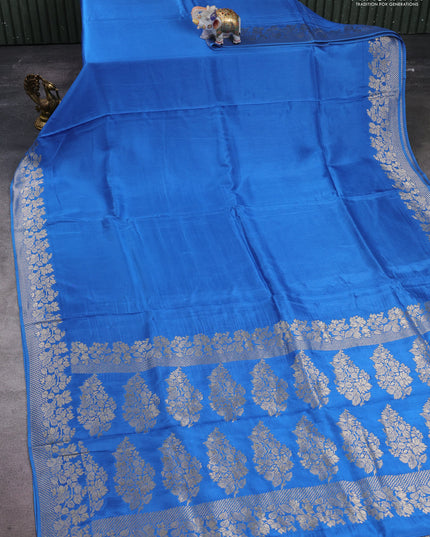 Dola silk saree blue with plain body and zari woven border