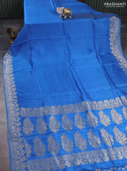 Dola silk saree blue with plain body and zari woven border