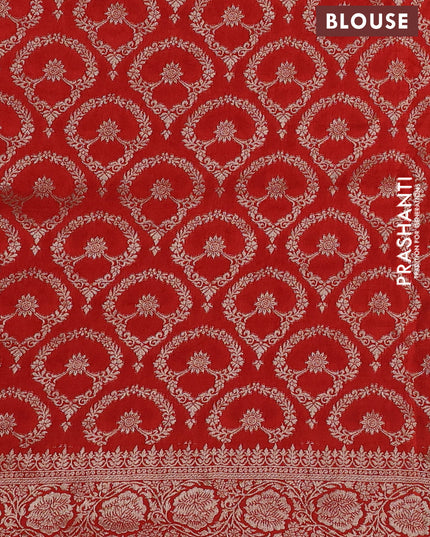 Dola silk saree rust shade with plain body and zari woven border