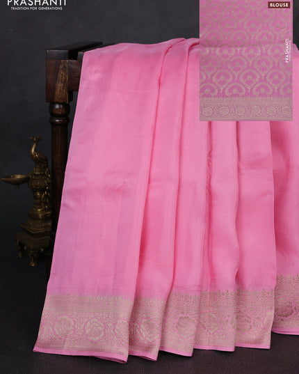 Dola silk saree light pink with plain body and zari woven border