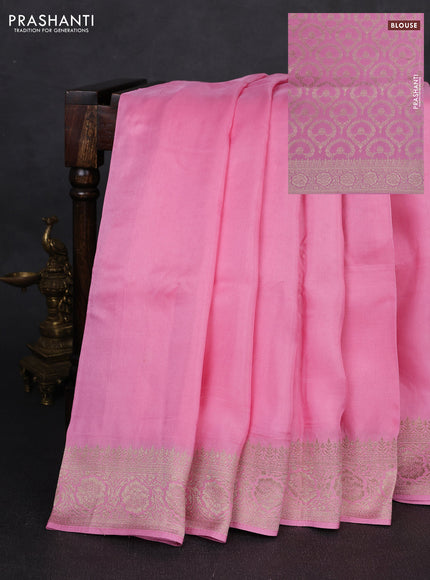 Dola silk saree light pink with plain body and zari woven border