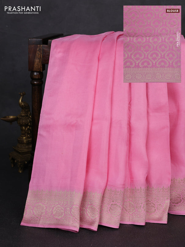 Dola silk saree light pink with plain body and zari woven border