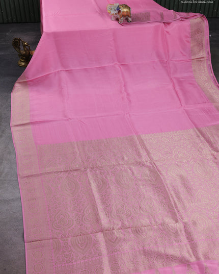 Dola silk saree light pink with plain body and zari woven border