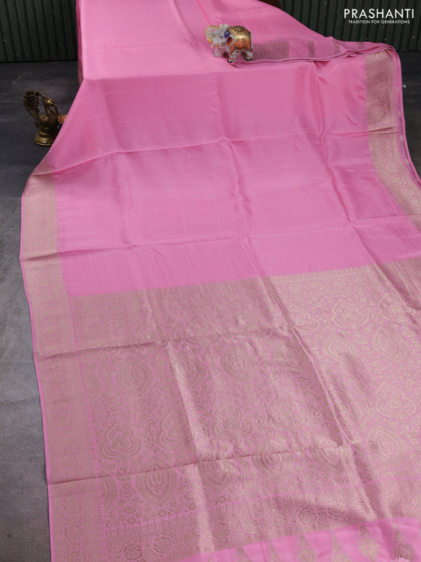 Dola silk saree light pink with plain body and zari woven border