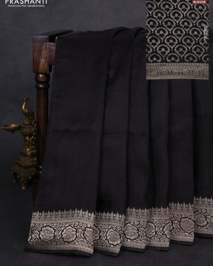 Dola silk saree black with plain body and zari woven border