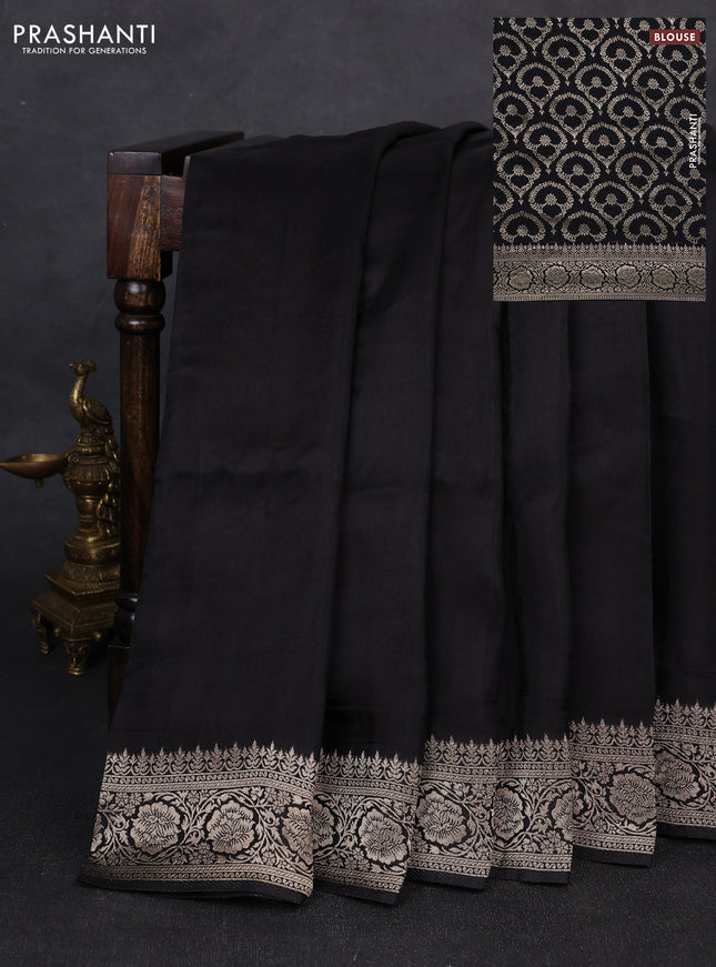 Dola silk saree black with plain body and zari woven border
