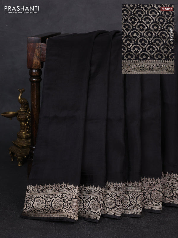 Dola silk saree black with plain body and zari woven border