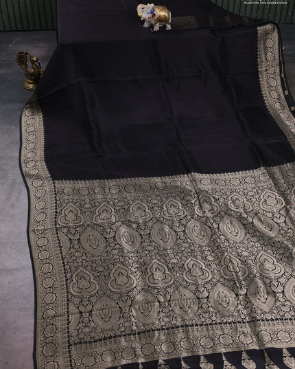 Dola silk saree black with plain body and zari woven border