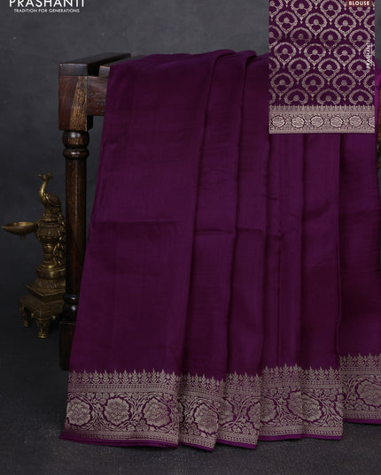 Dola silk saree wine shade with plain body and zari woven border