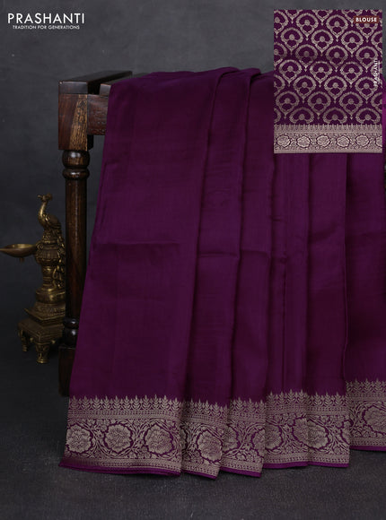 Dola silk saree wine shade with plain body and zari woven border