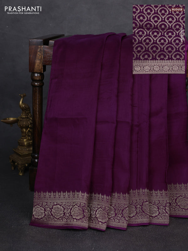 Dola silk saree wine shade with plain body and zari woven border