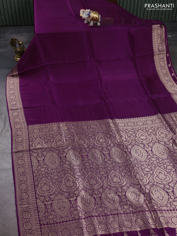 Dola silk saree wine shade with plain body and zari woven border