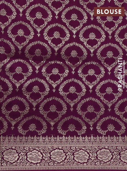 Dola silk saree wine shade with plain body and zari woven border