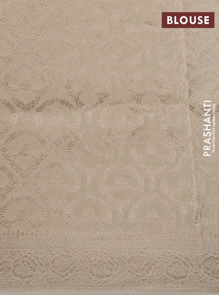 Dola silk saree cream with plain body and zari woven border