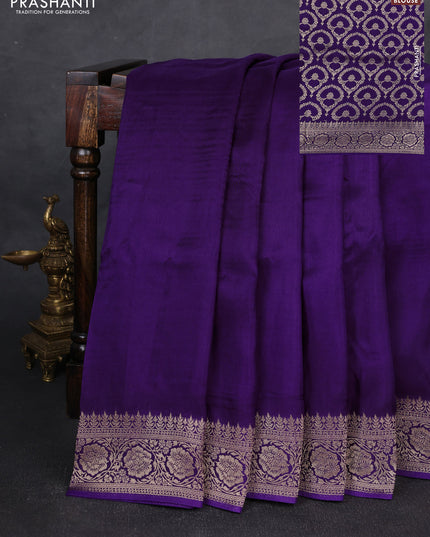 Dola silk saree purple with plain body and zari woven border