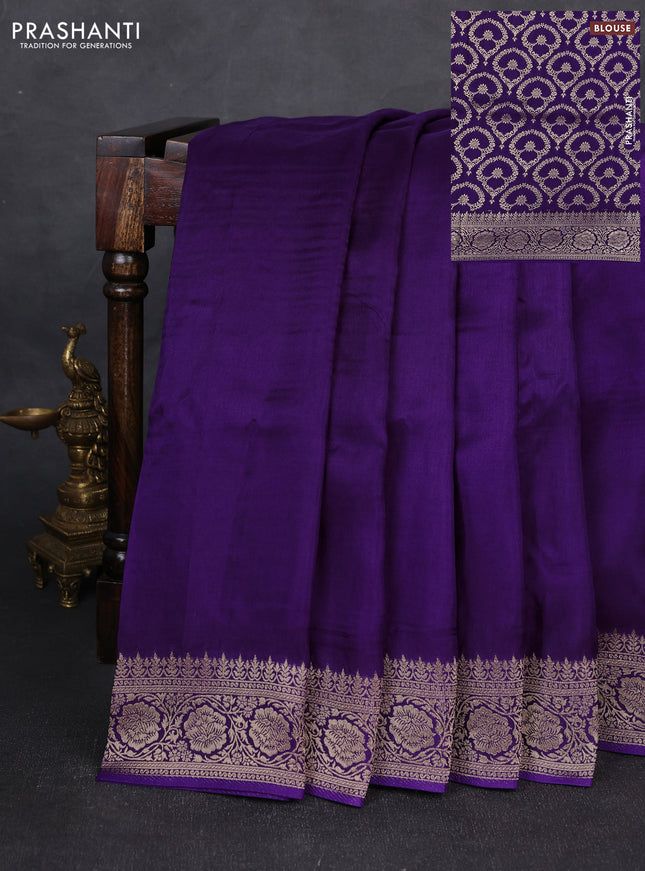 Dola silk saree purple with plain body and zari woven border