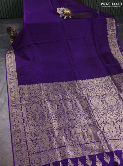 Dola silk saree purple with plain body and zari woven border